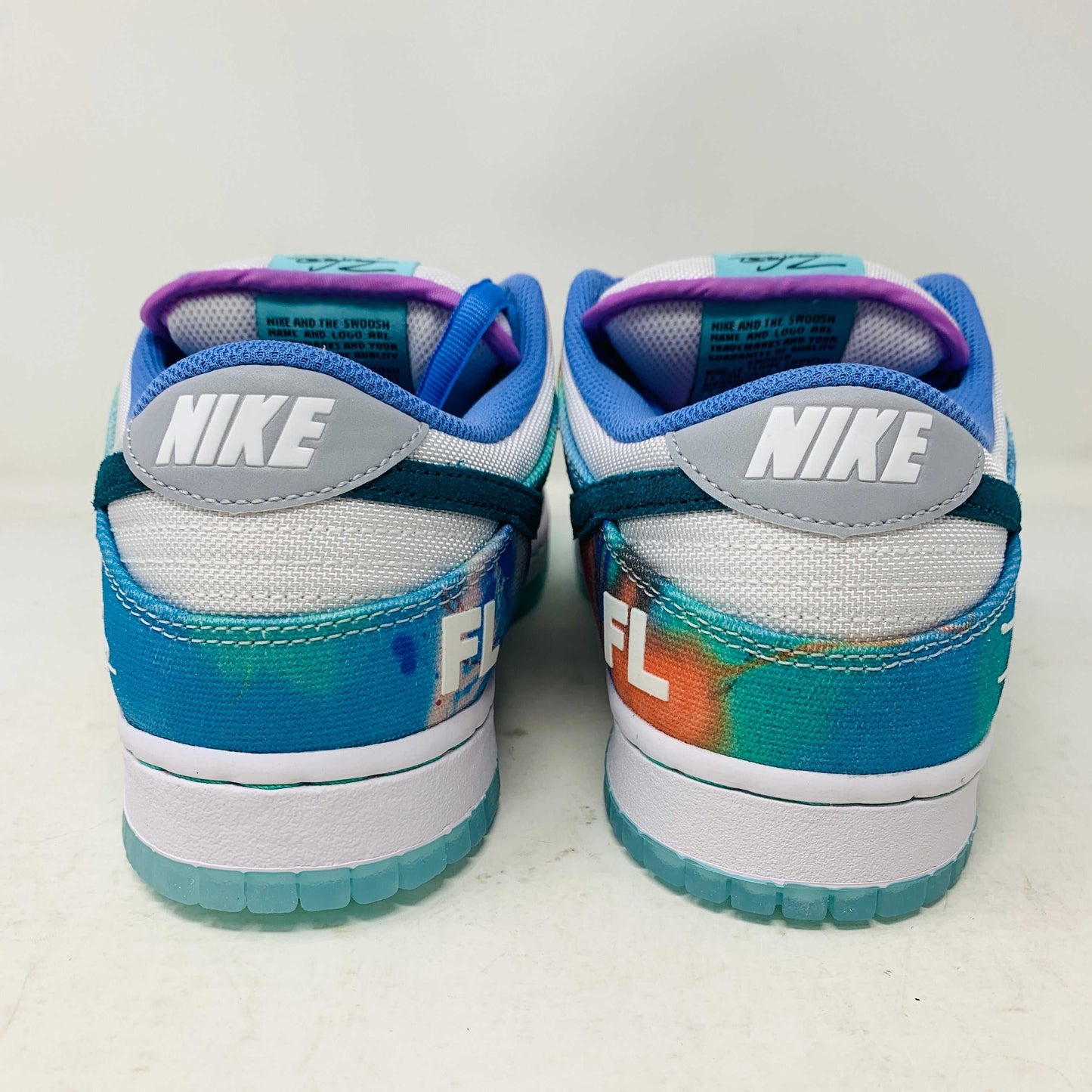 Nike SB Dunk Low Futura Laboratories Bleached Aqua sneaker with unique colorway and durable design.