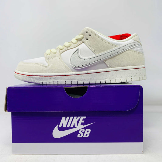 Nike SB Dunk Low "City of Love" Light Bone sneaker on box with purple Nike SB branding.